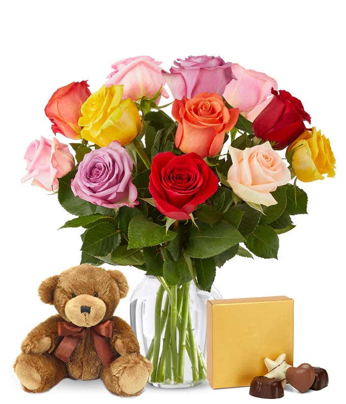 Mixed roses, teddy bear and chocolates