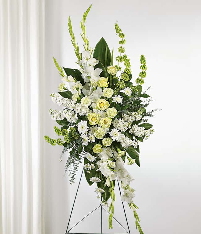 Standing Funeral Spray: Green roses, carnations, white gladioli, stock flowers, cushion spray chrysanthemums, and floral greenery, symbolizing love and reverence.