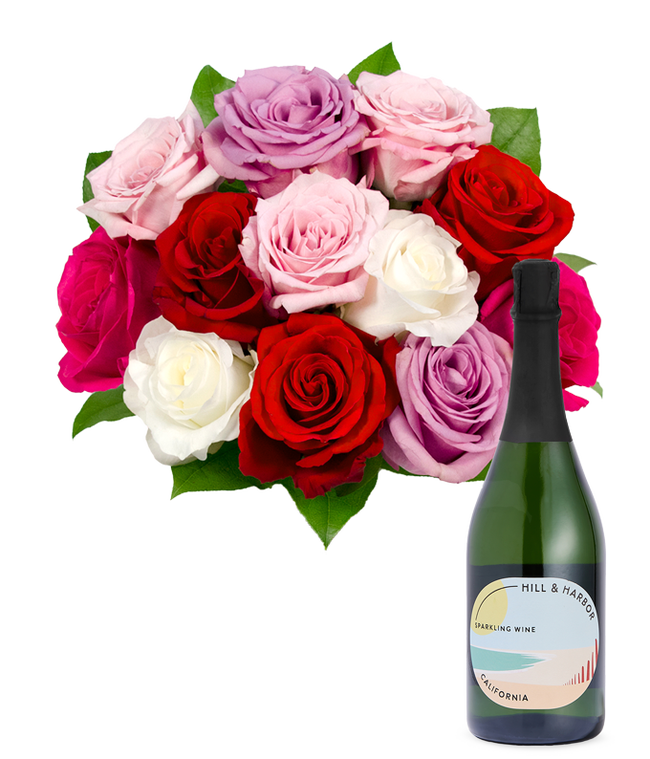 Partial image of A bouquet of pink roses, white alstroemeria, and lavender aster in a glass vase  without vase.